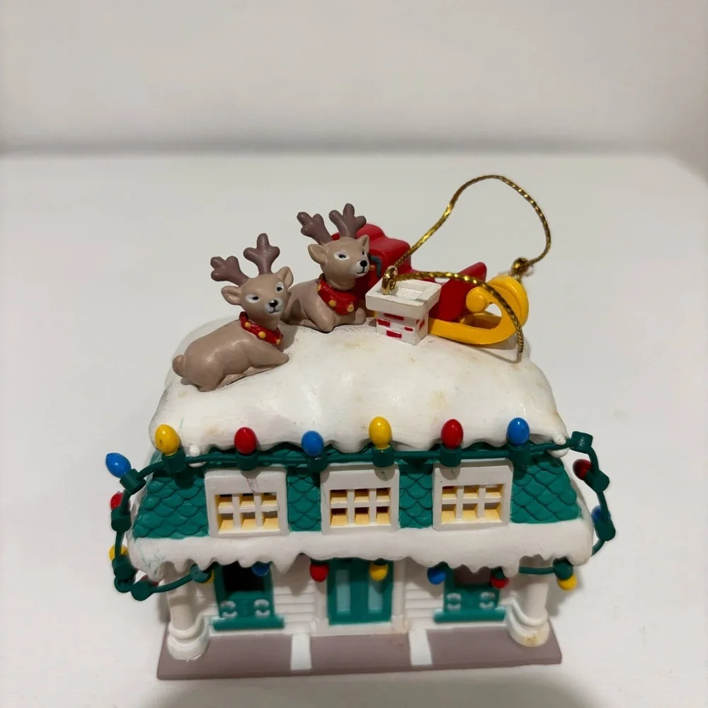 1991 up on the rooftop Christmas ornament plastic house reindeer Santa